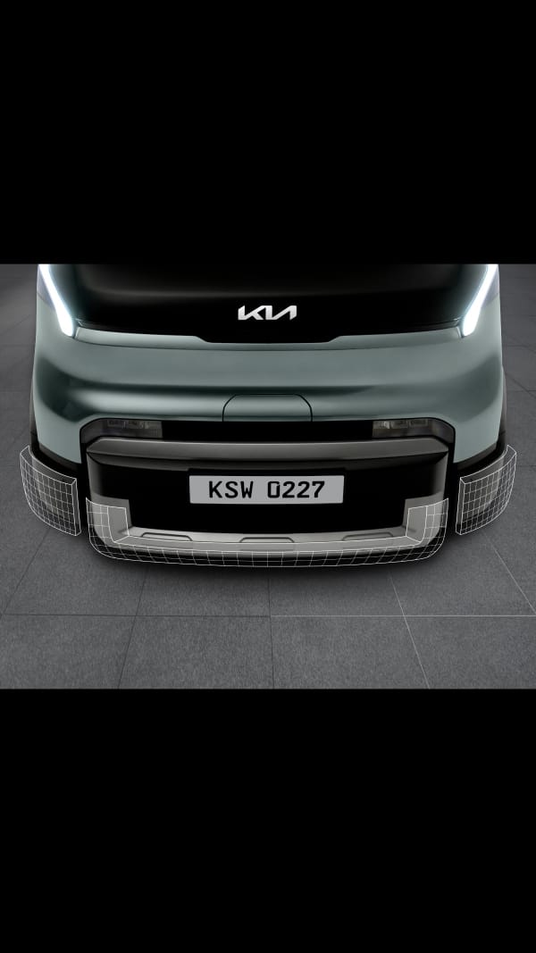 Nahaufnahme der vorderen Stoßstange und des unteren Kühlergrills des Kia PV5 WAV